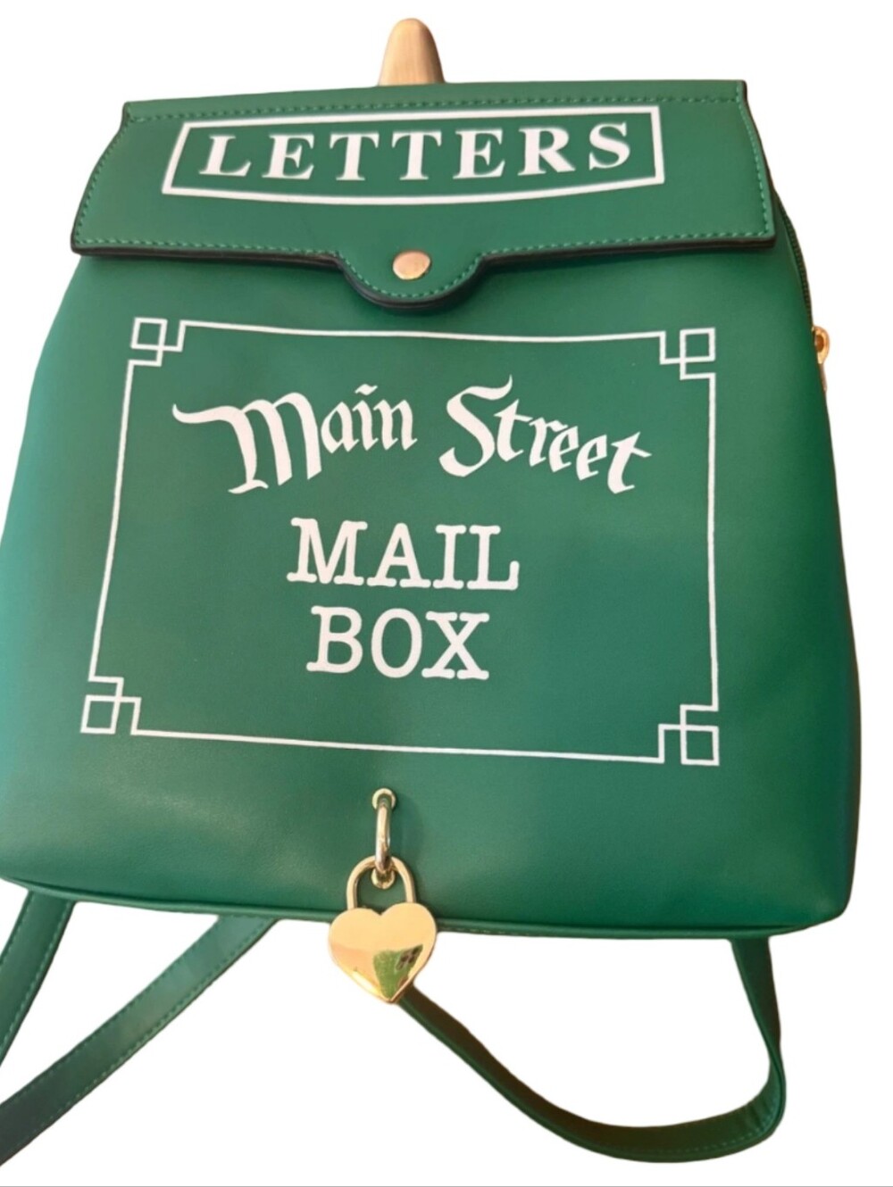 Park Candy Main Street Mailbox backpack in kelly green vegan leather.